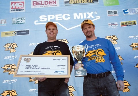 Left to right: mason tender Brian Tuttle and his brother, mason Scott Tuttle, on the winner’s stand. 