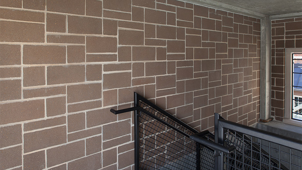 The same block used in the student center is used in the stairwell of the parking garage. This is one of the transitional uses of masonry to integrate the new elements of the church campus.