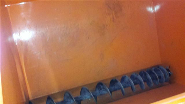 Masonry Grout Pump on jobsite in Perth, Material Valve — Auger System