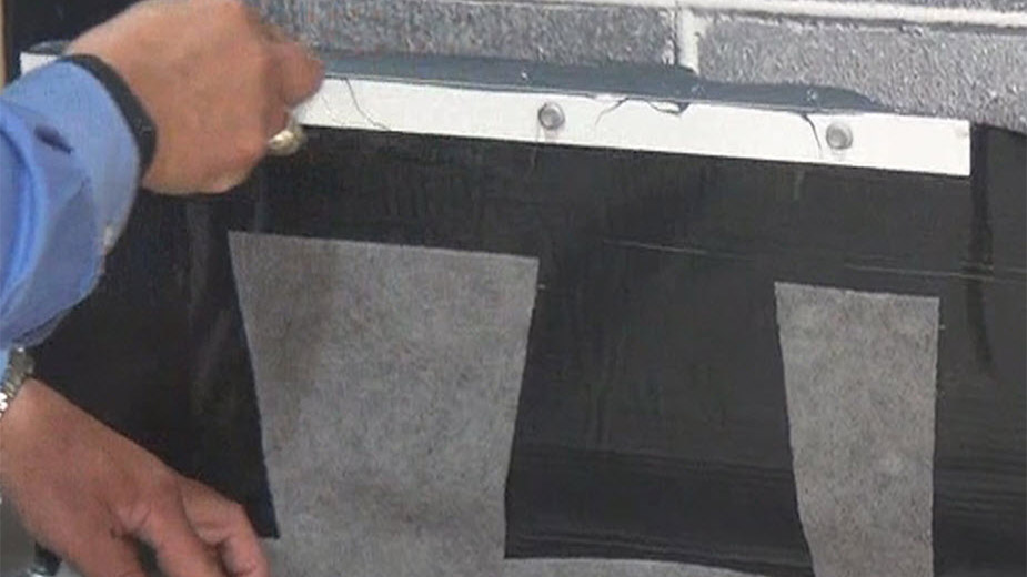 Figure 6 — Creating a proper seal at the top of a termination bar.